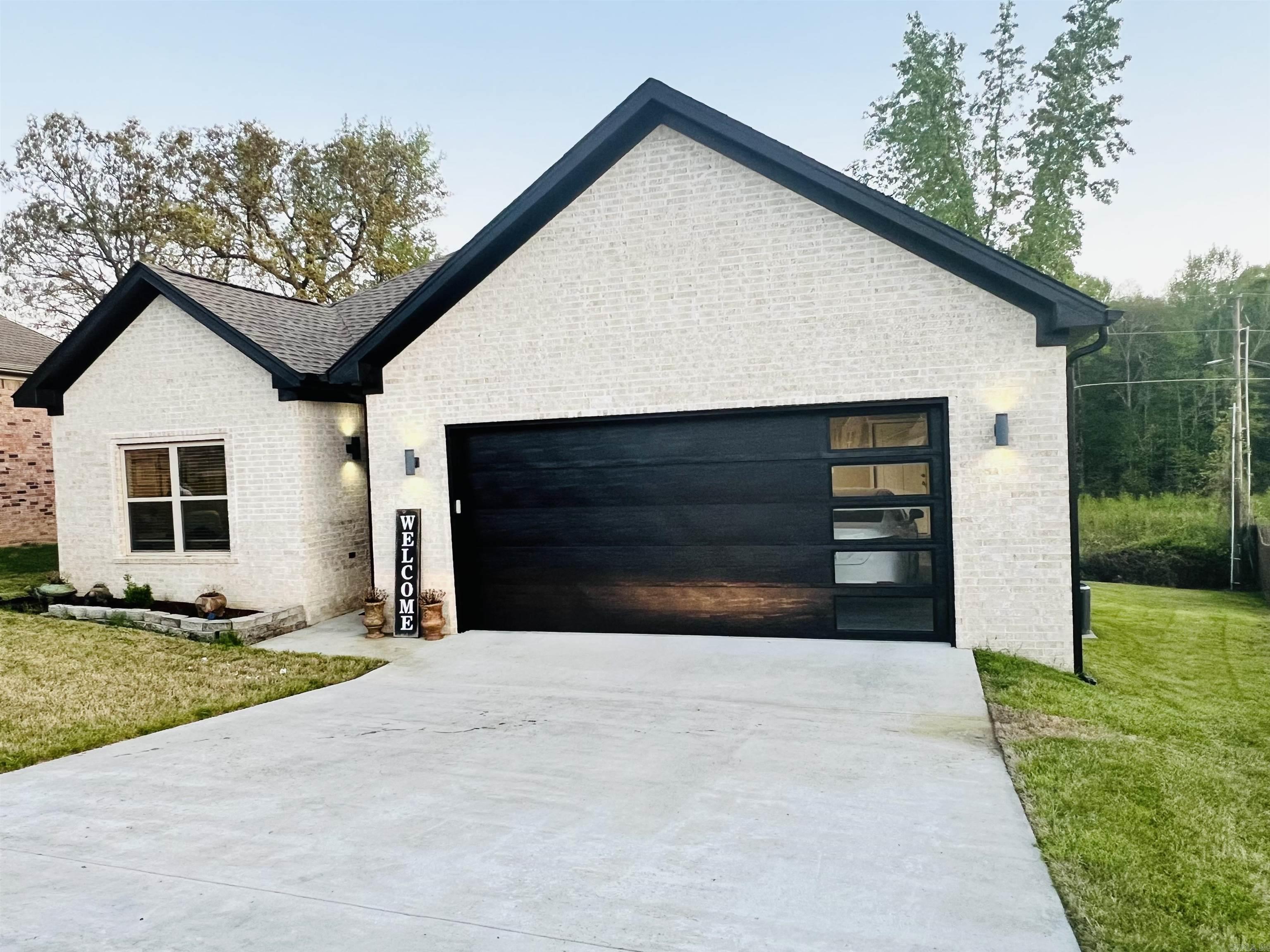 This Beauty in Hidden Lake Estates! Built in 2021, this home features concrete floors in main living areas for a clean/sleek look!. Large modern kitchen w/plenty of counter space & cabinetry! Spacious primary suite with a walk-in tile shower, separate tub&walk-in closet! Guest rooms feature carpet for comfort & ample storage in closets!. Open Floor-plan that's great for entertainment. AGENT SEE REMARKS