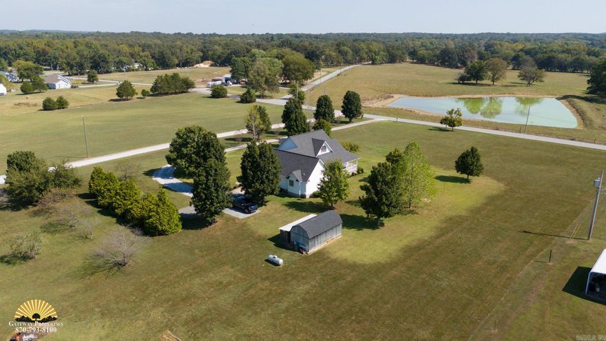 COUNTRY LIVING CLOSE IN!! Located just outside the city limits on 3 beautifully manicured acres!  Perfect place for retirees or families needing a one level home with outside space to entertain kids or grandkids.  Front and back covered porches provide room for grown-ups to chat while kids enjoy plenty of room to ride 4-wheelers or just play chase!  And if cooking is your thing, you're going to love all of the cabinet space and updated counters.  With a breakfast nook, a large eating bar, and a formal dining room you'll have plenty of room for holiday meals!  Warm up to the gas log fireplace on cool Fall or Winter days while watching movies or football on a big screen television.  The GREATROOM  separates two of the bedrooms from the primary bedroom.  Ladies, get your bath bombs ready to soke in your jetted bath. Yes, there's also a separate shower if that's your preference.   You might even gasp a little when you see the size of the walk-in closet!  The detached storage building already has power and would make a nice little workshop.  Or, just store tools and lawn equipment to keep them out of the garage.  Roof replaced in 21', HVAC in 20' and a $10,000 Floor Allowance!