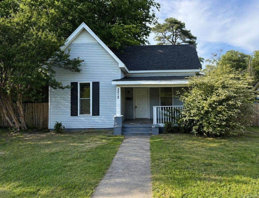 INVESTOR SPECIAL in one of Little Rock's most convenient pockets! This 1912 three-bedroom, 1.5-bath home sits just steps from historic Lamar Porter Field and less than a minute to I-630 — putting downtown, UAMS, and midtown all within minutes. The home needs a full renovation including foundation work and complete cosmetic updates throughout. Roof, HVAC, and water heater are believed to be functional (buyer to verify all systems and conditions). With comparable move-in-ready homes in the area selling in the $179,000–$185,000 range, the upside is built in for the right investor, flipper, or rehabber. Gravel driveway, small lot, no garage. Utilities are on for showings. Sold AS-IS, cash only. Bring your vision and your contractor — properties with this kind of location and early-1900s character rarely hit the market at this price point.