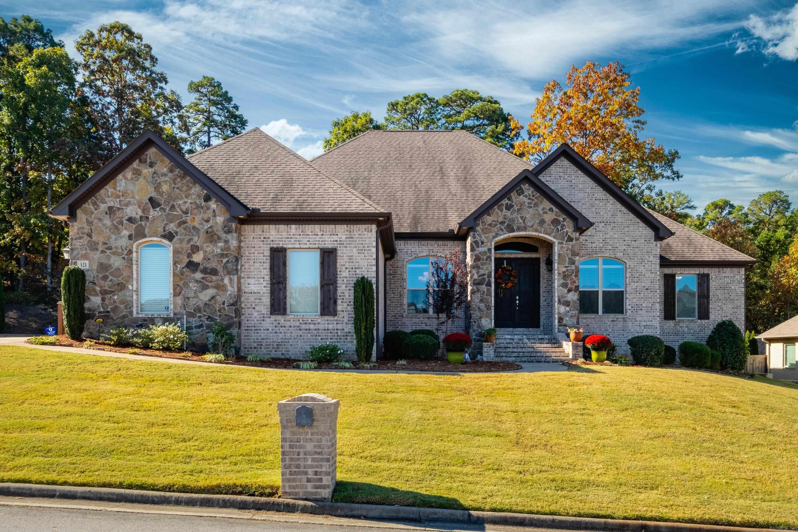 NOTE: SELLER TAKING HOUSE OFF THE MARKET THROUGH CHRISTMAS. One level 1 owner custom brick home w/3 car side-load garage located on quiet street. Spacious covered porch w/ woodburning fireplace offers entertaining space & privacy. Access to golf cart path in Miramar. Stairway in garage leads to floored attic. 4 BR/3 1/2 B. 2 Bedrooms on 1 side & 2 bedrooms on other side. Large primary bedroom & 2 primary closets - bath w/tub + oversized walk-in shower w/ rain head & dual shower heads. Separate office w/ French doors. Formal dining, breakfast area in kitchen + breakfast bar. Abundance of cabinet storage & granite countertops. Stainless Frigidaire appliances include 5 burner gas surface range, double built-in wall ovens, dishwasher & microwave. Greatroom windows look onto porch & private backyard. Fireplace w/ gas logs in living area + built-in bookshelves. Separate laundry + built-in coat rack & storage bins at side entry. Rare to find a one level home.
