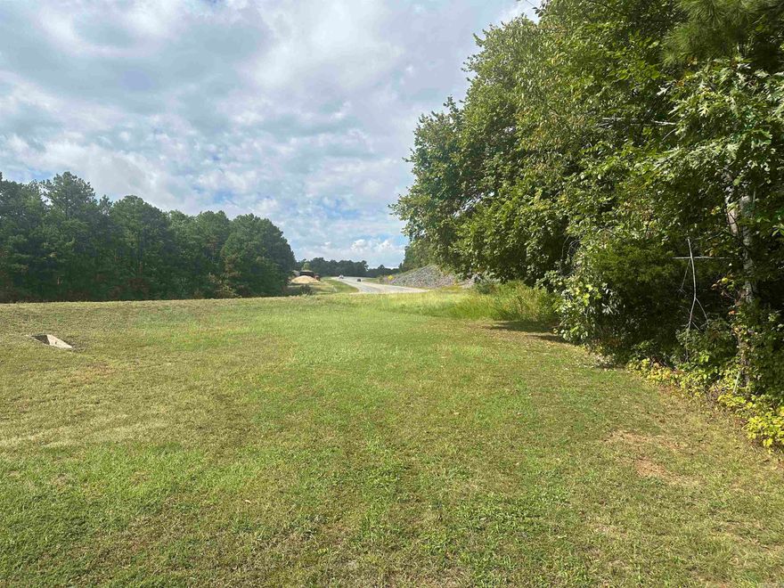 This can be residential with doing a little dozer work, cut out and pad made, or be good commercial property next to the Cedar Furniture Store on US Hwy 65 4 4-lane Hwy, AKA Branson Tourist Hwy. You would have all of small-town America, Clinton, Arkansas, amenities just 10 minutes to the south, while living in the Boston Mountains and Leslie, Arkansas, 10 minutes to your north.