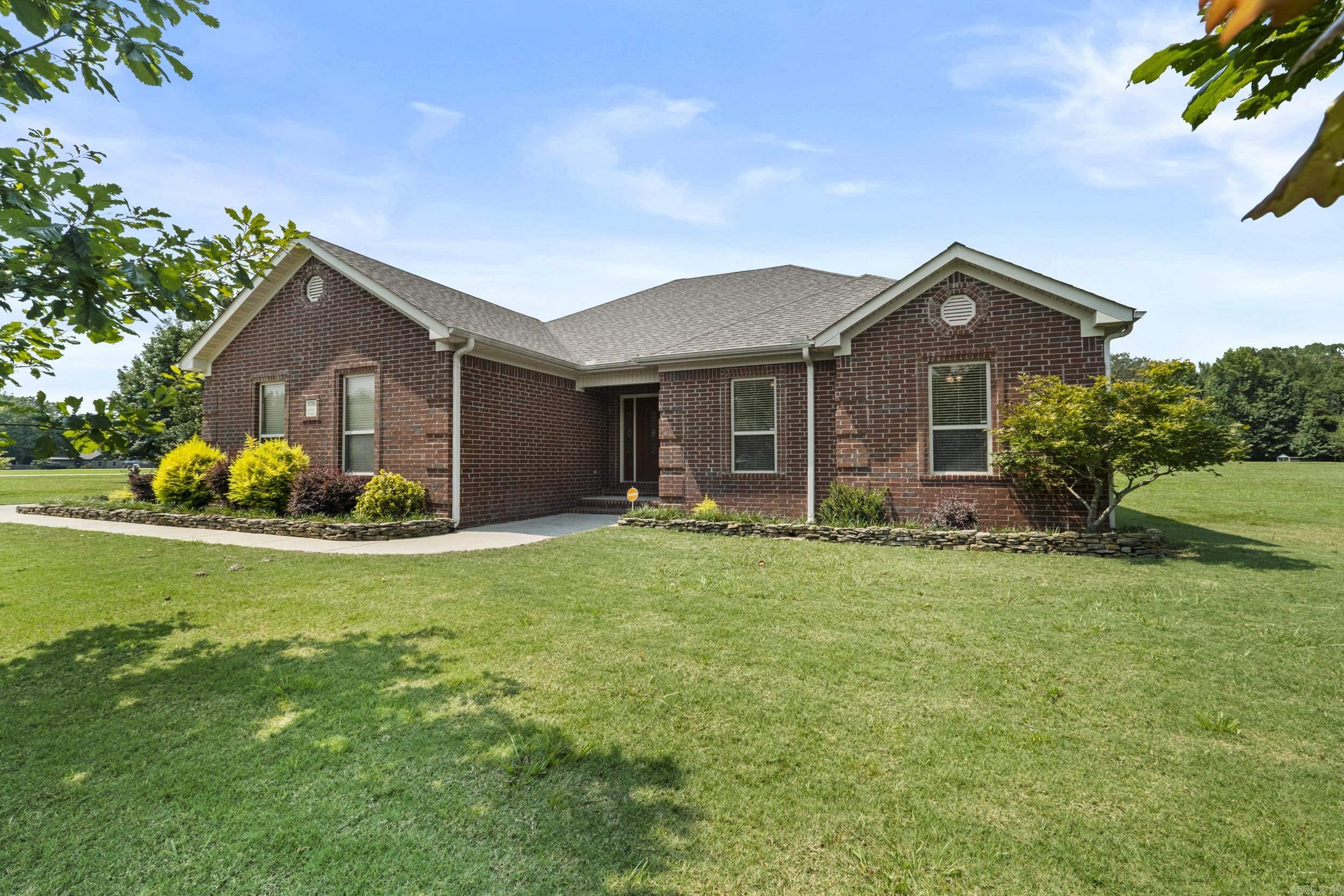 Pride of Ownership Shows in this Rare Find Home with Acreage in the Cabot School District! Nestled in the peaceful and serene Sandy Creek neighborhood, just outside the hustle & bustle, this Beautiful All-Brick, 3-bedroom, 2-bath home is a rare find! The inviting Great Room sets the tone, and in 2019 a Spacious 600 sq.ft. Craftsman Style Family Room was added Featuring Beautiful Wood Flooring, Large Windows, Vault Celings, & Rock Fireplace! A Perfect place to entertain or for Large Family Gatherings! The Kitchen offers Stainless appliances, Corian Countertops, Tile Backsplash, Pantry & Large Breakfast area! The Split Primary Bedroom is Spacious and Features a Private Bath with Dual Vanities, Walk-in Shower, Separate Tub and HIS/HER Closets! Both Spare Rooms are Large and Inviting! Sitting on Over an acre with a Storm Shelter for Peace of Mind, this property also offers the option to purchase an additional 1.3 Acres (MLS #25031764) for even more room to spread out! Well maintained and recent improvements include a New HVAC compressor in 2025 & the Roof is only 2 years old! Security System included. Don't miss this opportunity! SEE Also MLS #25031764