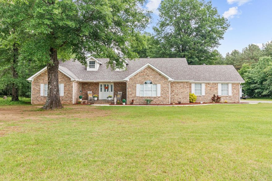 Welcome to your dream home! Nestled on over 11 picturesque acres, this beautifully updated 3-bedroom, 2.5-bathroom residence offers the perfect blend of country living and modern convenience. Every aspect of this home has been meticulously updated in the last few years, including the plumbing pipes and roof, ensuring peace of mind and a move-in-ready experience.  Step inside to discover a bright and inviting kitchen, designed with both style and functionality in mind. The spacious rooms throughout the home provide ample space for relaxation and entertainment.  Outside, you'll find a large deck perfect for enjoying serene countryside views and hosting summer gatherings. Additionally, a versatile 22x30 shop offers plenty of room for hobbies, storage, or potential business ventures.  Located on a paved road just minutes from city limits, this property offers the best of both worlds: the freedom and tranquility of county living with the convenience of nearby urban amenities. With no restrictions, you have the freedom to truly make this property your own.  Don't miss this rare opportunity to own a slice of paradise!  *See Agent Remarks for more information*