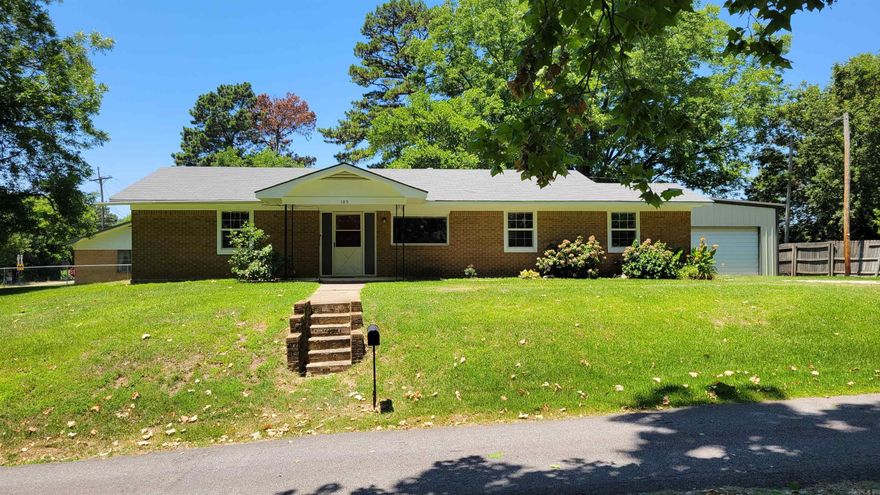 Beautiful 3BR,2BA, Corner Lot, on 0.46 acres.  This all-brick home offers: spacious living room, Nice Kitchen area with gas stove and built in oven, home features a downstairs storm cellar. Outside offers covered parking space and a large shop or separate garage area.  Corner lots offers plenty of space for additional flowers or gardening.