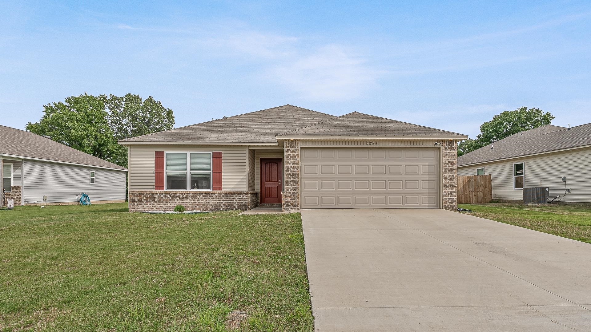 Welcome to this beautifully designed 3-bedroom, 2-bath home built in 2023, offering modern comfort, energy efficiency, and a convenient location. The spacious open floor plan features a large living area filled with natural light, creating a warm and inviting atmosphere. The kitchen is both functional and stylish, complete with a breakfast bar, pantry, and plenty of counter space—perfect for cooking and entertaining. The split floor plan provides added privacy, with the primary suite separated from the additional bedrooms. Step outside to a covered back patio that overlooks a fully privacy-fenced backyard, ideal for pets, play, or relaxing evenings. The 2-car garage includes a workbench—great for woodworking, hobbies, or extra storage. This all-electric home is built for energy efficiency to help keep utility costs low. Located just minutes from Arkansas State University, NEA Baptist Hospital, and downtown Jonesboro, you’ll enjoy easy access to shopping, dining, and schools.