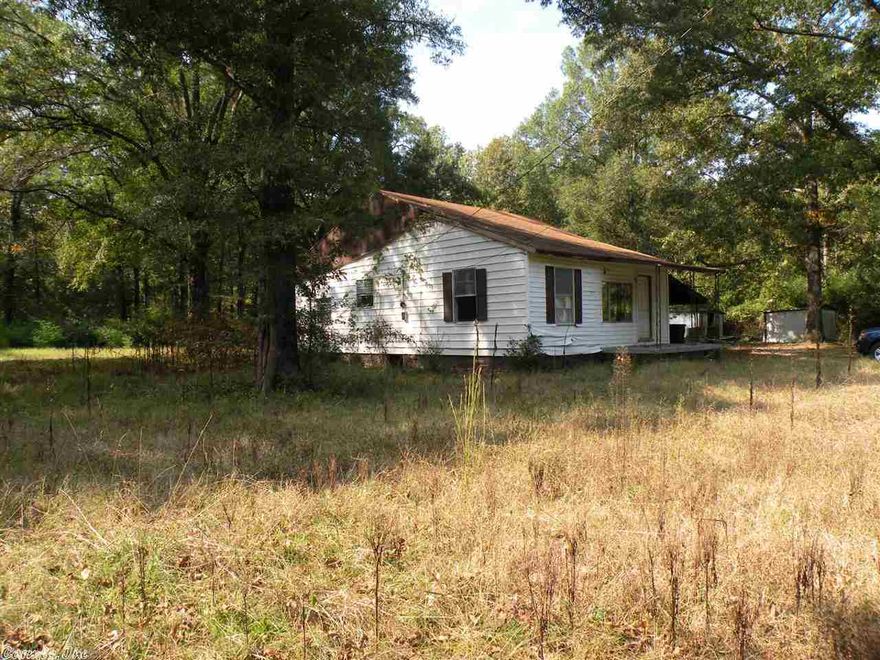 Foreclosed home being sold for land value. Caution when entering home or showing home. The house needs extensive work but could be salvaged. It is improved land, fully fenced lot, power, water & septic available. Proof of funds or pre-qualification of loan must accompany any offer. Seller does not pay customary closing cost. Strictly as is, where is, no disclosure available.