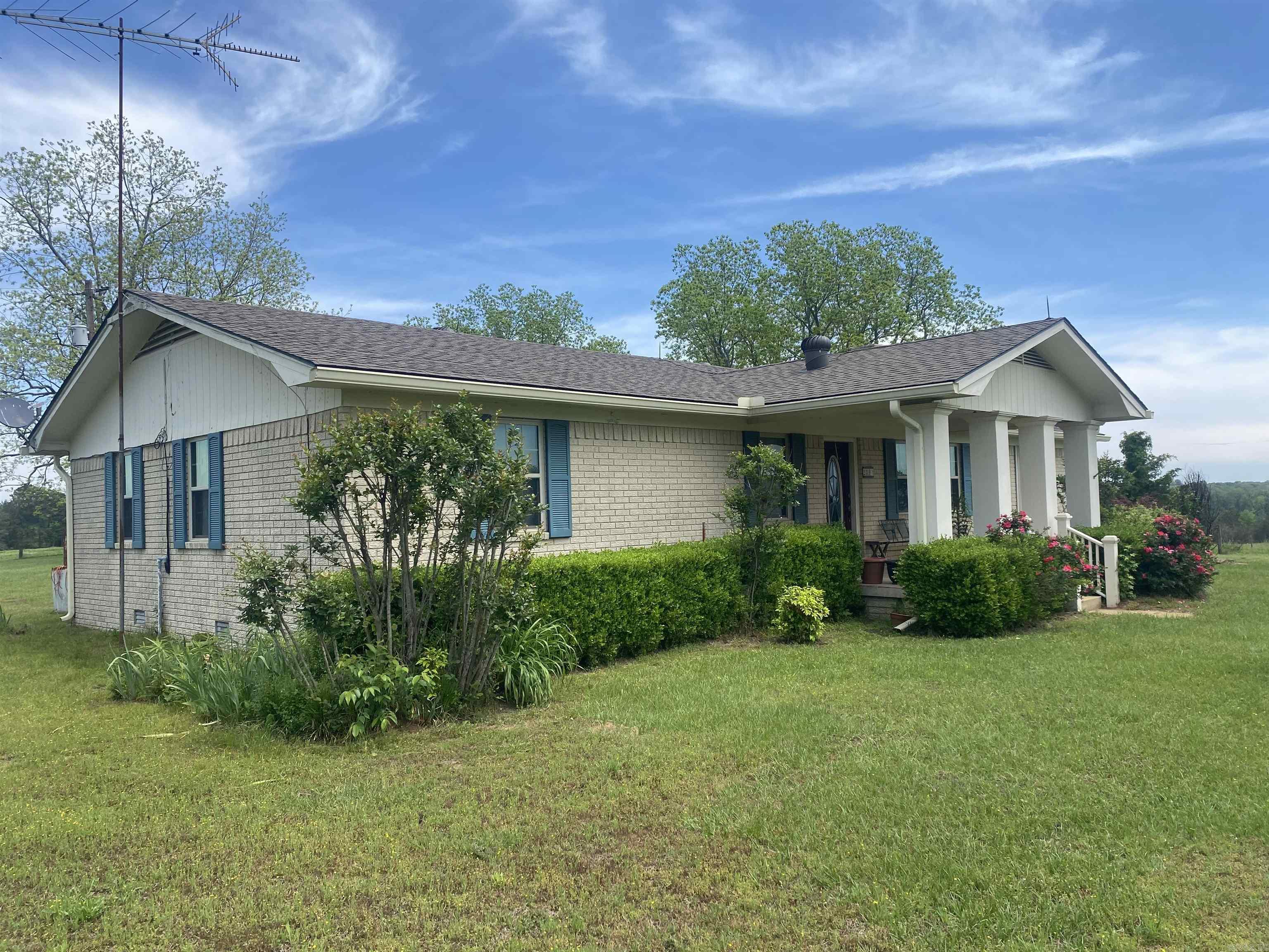 Located east of Nashville, the property offers a well maintained home with approx 40 acres, fenced for cattle, large barn, pole shed, storage building and general purpose barn. Brick home offers over 2,300 sq ft of living space w/ 3 bedrooms and 2 1/2 baths, large living room, kitchen and laundry room. Newer roof, CH/CA, well water ( rural water is available at the road ) and detached double garage. Contact our office for more details or to schedule a private showing.