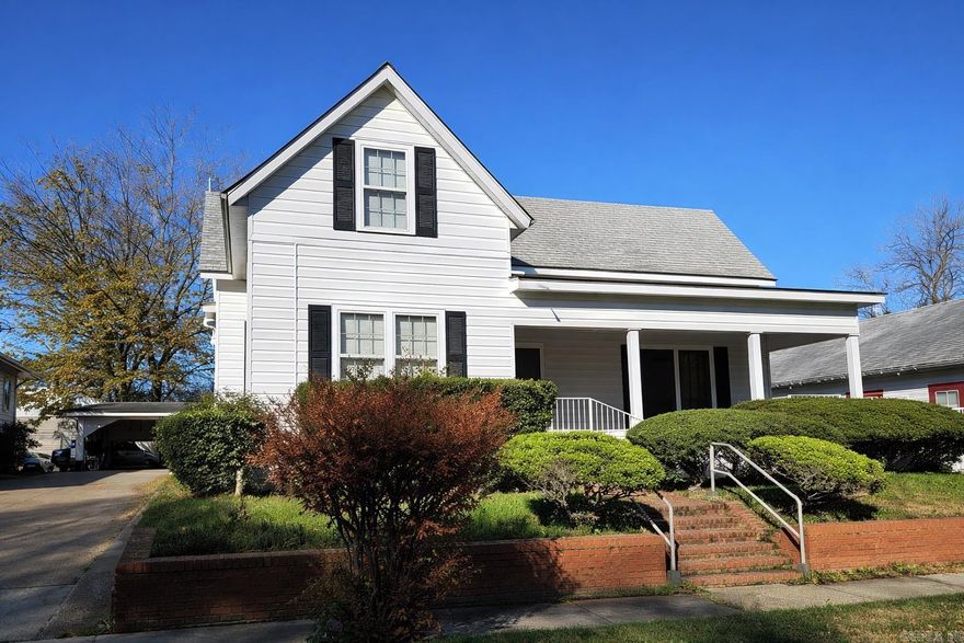 3 possibly 4 bedroom 2 bath home with a 1 car carport