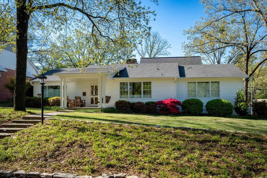 Wonderfully updated house in Kingwood that lives like a one level on two lots! Two living areas on the main level...formal living room and den/dining area. The kitchen has stainless steel appliances, corian countertops, custom cabinets and plenty of natural light. Two bedrooms on the main level both with walk in closets. Two baths on the main level have been updated. Site finished hardwood floors throughout the main level. Third bedroom is above the garage with a walk in closet and full bath. Hard board siding exterior. The home also has  side loading garage. Impeccable landscaping. Fully fenced with large backyard, patio, fire-pit, garden and storage shed. Cellulose insulation, Generac full house generator. Roof 2017.