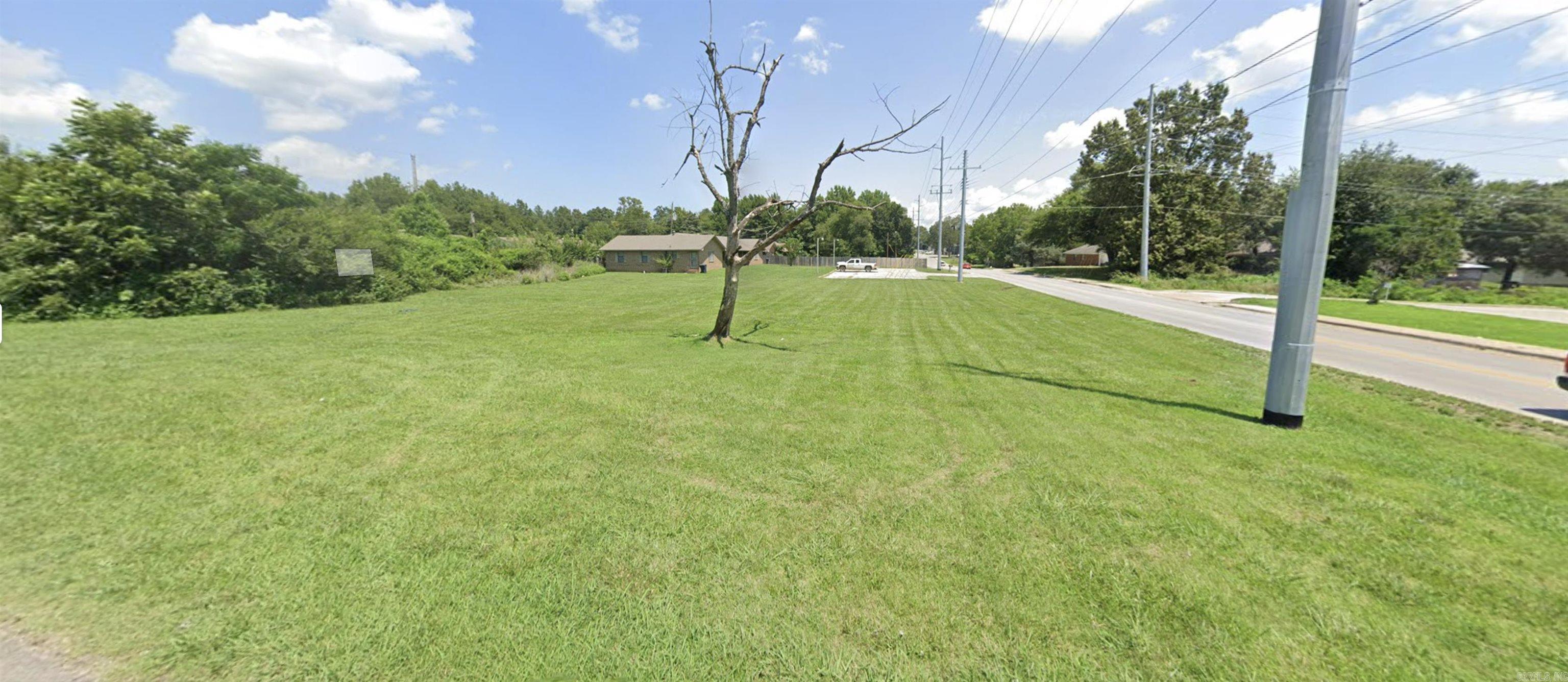 Prime corner lot opportunity in Jonesboro! Located at the intersection of Scott Street and Belt Street, this 0.5-acre parcel offers excellent visibility and access. Zoned R-2, it’s ideal for residential development or investment. With its convenient location and corner positioning, this lot provides flexibility and potential in a growing area of town.