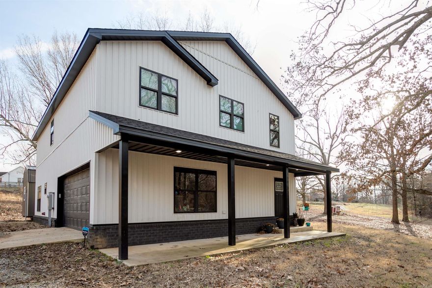 Looking for peace and quiet? How about a Farmhouse on 21.8 acres!! This wonderful home features 4 bedrooms, 2.5 baths with 2200 sq ft. Open living room and kitchen with dining area and breakfast bar. Upstairs you'll find the primary bedroom and bath, with 3 more secondary bedrooms and a full bath. Step outside to the back porch perfect for grilling, relaxing, or just a little serenity. Did we mention the 12.8 acres with 2 pastures and a pond?! 18 of the 21 acres is fully fenced, and ideal for your horses or cows. You will also see lots of deer on the property. Call to schedule a tour!