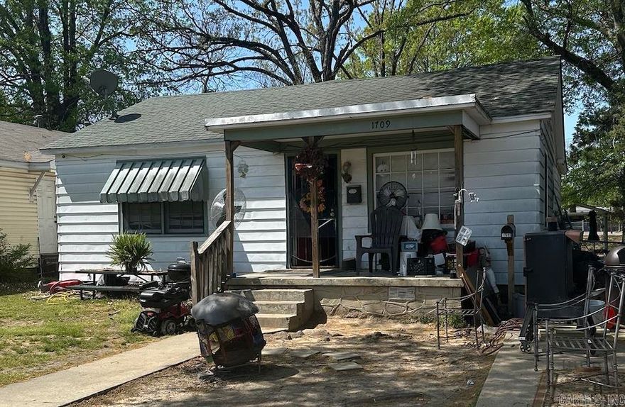 Investment opportunity! There are two dwellings on this property.  The larger home in front has 3 bedrooms, 1 and 1/2 bath.  The ADU home on the back of the property has 1 bedroom and 1 bath. Both Tenant Occupied.  No Property Disclosure. As-is.
