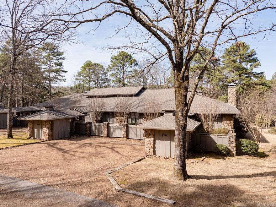 Highly sought after Eden Isle LAKEFRONT CONDO!  This 2-bedroom, 2-full-bath, END-UNIT, furnished condo has views of Greers Ferry Lake and Lake Eden, a very spacious open floorplan with lots of glass, stone fireplace, cathedral ceilings in living, large kitchen with eat-in area and new quartz tops, wet bar, nice deck and great grassy yard to play in!  Primary suite has walk-in shower and separate tub.  Small golf cart garage, lots of parking and covered entry walk-way.  New roof in the last 5 years!!!