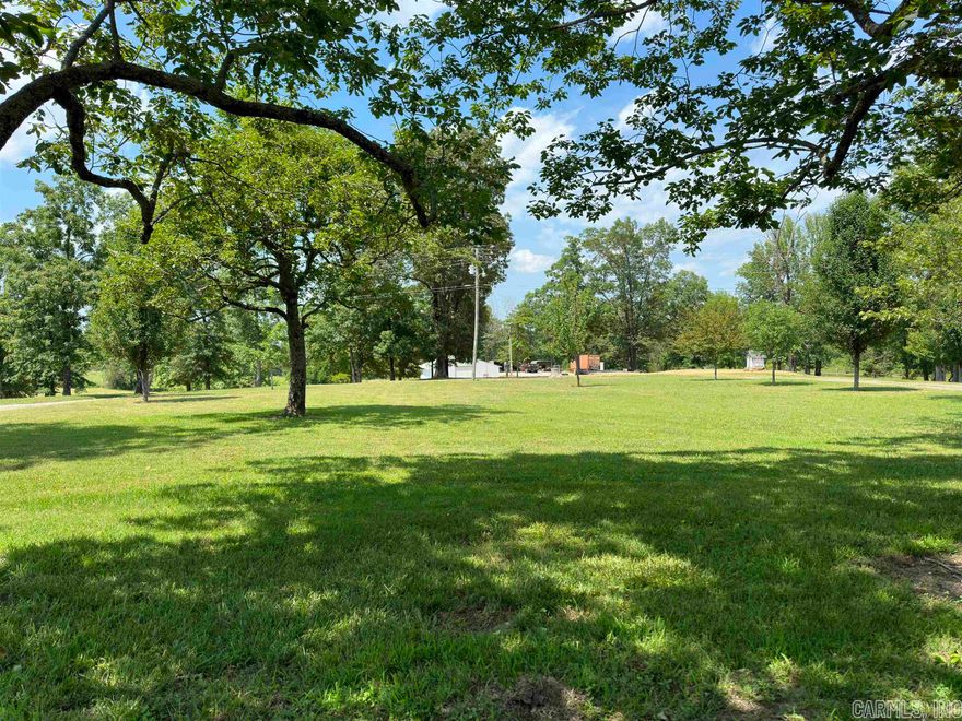 MOTIVATED SELLER!!!  You will find this property surrounded by mature trees as you enter the circle drive.  Great spot for livestock or use part of the acreage for a hay field. So many possibilities with this acreage.  You will find a 42x72 shop for all your toys or equipment, a pond and not to mention the perfect spot to build your dream home.  This property has 600’ of highway frontage and it is cleared and ready to go.  Current survey available. Call today to tour this property!