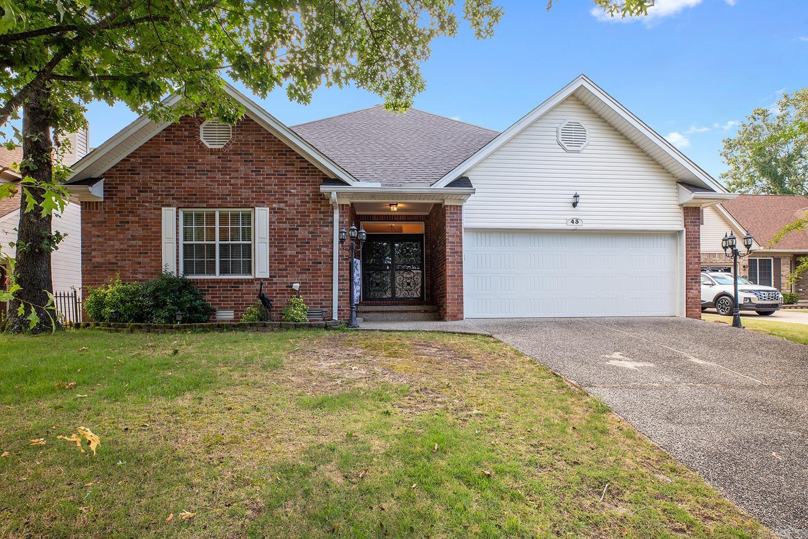 Tucked away on a quiet cul-de-sac, 43 Rocky Valley Cove blends comfort, charm, and convenience in one beautiful brick package. Step inside to find an inviting layout with a wonderful dining room and a spacious great room featuring hardwood floors, soaring ceilings, and a cozy fireplace; perfect for relaxing or entertaining. Love to cook? Youāll fall for the oversized kitchen with a large island, granite countertops, newer appliances, and tons of cabinetry, perfect for any home chef. The split floor plan offers privacy with the primary suite separated from the other two bedrooms on the main level. Upstairs, enjoy a bonus/game room plus walk-out attic storage for all your extras. Recent updates include a newer roof and a brand-new HVAC system for year-round comfort and energy savings. Step out onto the elevated back deck and soak in the view of your beautifully landscaped, fully fenced backyard, and conveniently located near shopping and restaurants. The custom wrought iron fence adds a touch of elegance that truly sets this home apart. Call today for your own private showing!