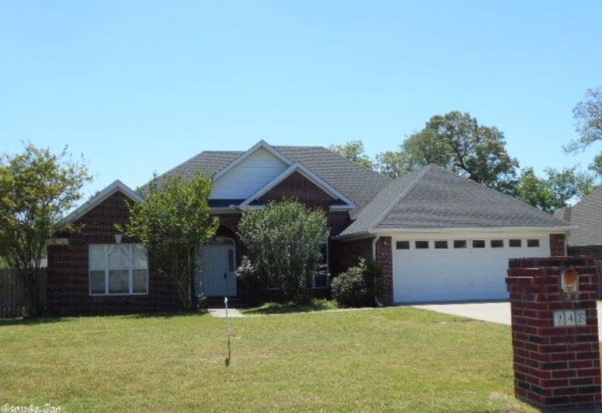 New granite counters being installed June 2015! Brand new carpet, interior paint and stainless steel appliances! Almost like buying a new home! Fabulous floor plan with big open rooms and lots of windows!  Formal dining room has hardwood flooring and flows right into the living area with fireplace.  Split bedroom plan. Fenced back yard with wood deck.  All brick home and ready to make it yours! For comps, see agent notes