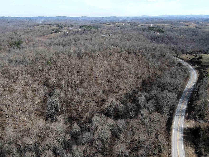 - 18.74 +/- acres of timber - Wet weather creek - Mature hardwood mix - Utilities on the property - Great topography - Paved highway frontage - Beautiful views - Great hunting - 5 miles to Buffalo National River at Dillards Ferry - 12 miles to Marshall