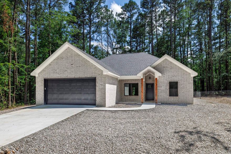 New construction by Jackson Custom Homes is scheduled to be complete end of May! All brick home located in the middle of the Village giving you easy access to area amenities. Tongue and groove wood ceilings front and back porch. Open the door and walk in to the open floor plan including kitchen with an island. Custom shaker cabinets with soft close drawers and doors. Quartz counters throughout. Windows bring the outside in to the living/dining area with fireplace. Primary bath has a zero entry walk in tile shower, two sink vanity and walk in closet. Energy efficient with modern finishes. Covered patio for nature watching. Builder one year warranty. Taxes lot only.  Agent Remarks.