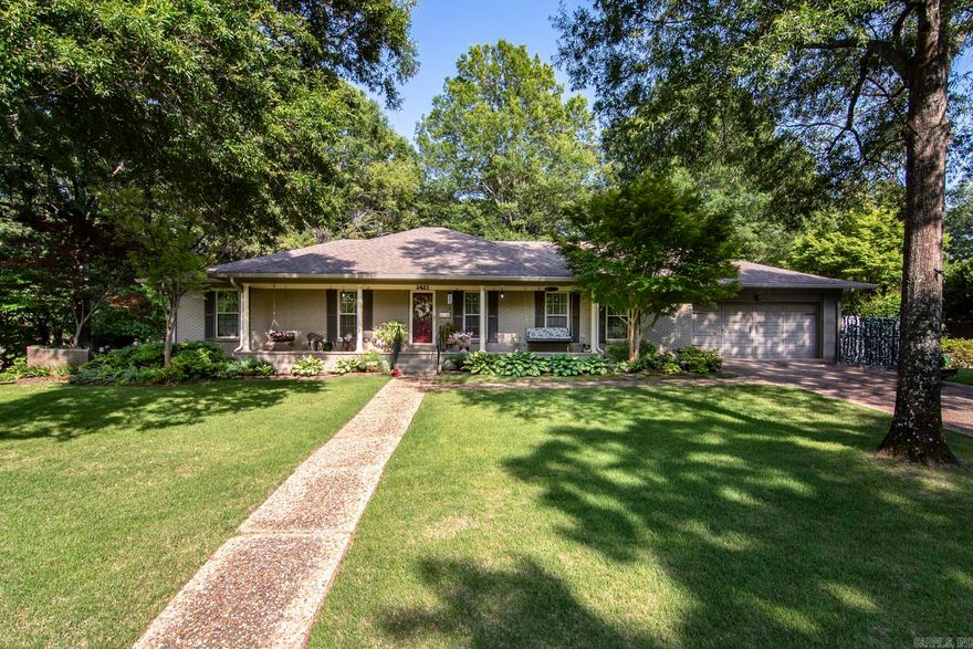 Under Contract before listed. Classic one-story all brick home in Pleasant Valley offers timeless curb appeal and a warm welcome with its inviting front porch. Inside, the well-designed floor plan features 3 bedrooms, 2 full baths, and a spacious laundry room.  The kitchen and bathrooms showcase neutral tones and granite countertops, blending style with functionality. The primary suite includes a renovated bathroom, accessible through a stylish sliding barn door and features a large walk-in shower. The formal living room opens seamlessly to the family room with a cozy fireplace, as well as to the dining room, creating a perfect flow for everyday living and entertaining. The eat-in kitchen boasts a gas cooktop, double ovens, ample cabinetry, and generous counter space. The adjacent dining room includes a full wall of built-ins to display your favorite pieces. Sliding glass doors from both the main living area and the primary suite lead to a stunning backyard oasis--complete with lush landscaping, a tranquil water feature, and stone patios ideal for relaxation and outdoor entertaining.