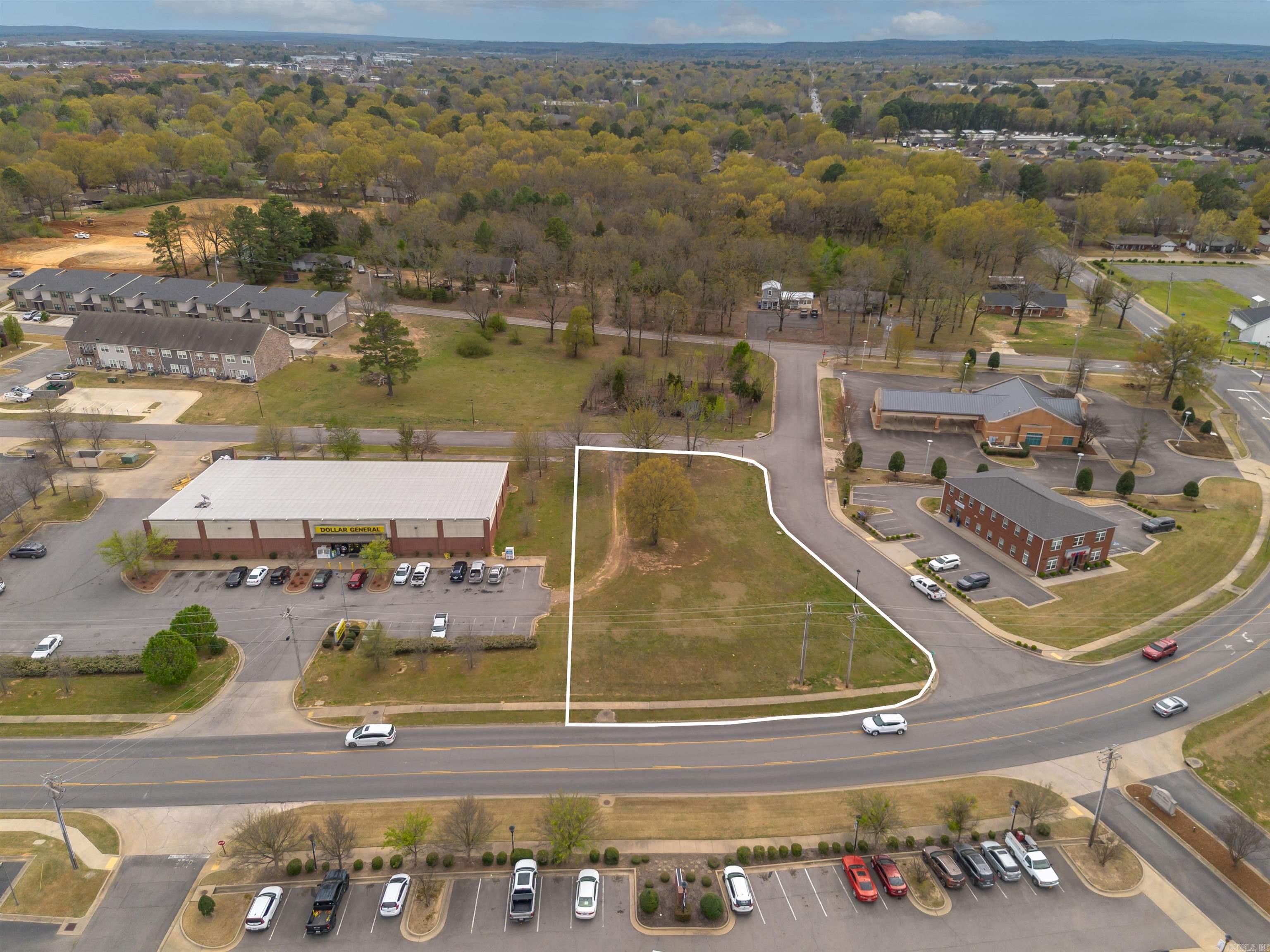 This commercial property offers exceptional potential for your next business venture! Located in the heart of North West Conway, it boasts a prime spot with a high traffic count on Donaghey. The property sits next to Dollar General, ensuring great visibility and foot traffic. With its mixed-use development zoning, the possibilities are endless – whether you're looking to start a retail shop, office space, or another business type. Don't miss out on this fantastic opportunity in one of Conway's most desirable locations. Perfect for entrepreneurs looking to make an impact in a growing area!