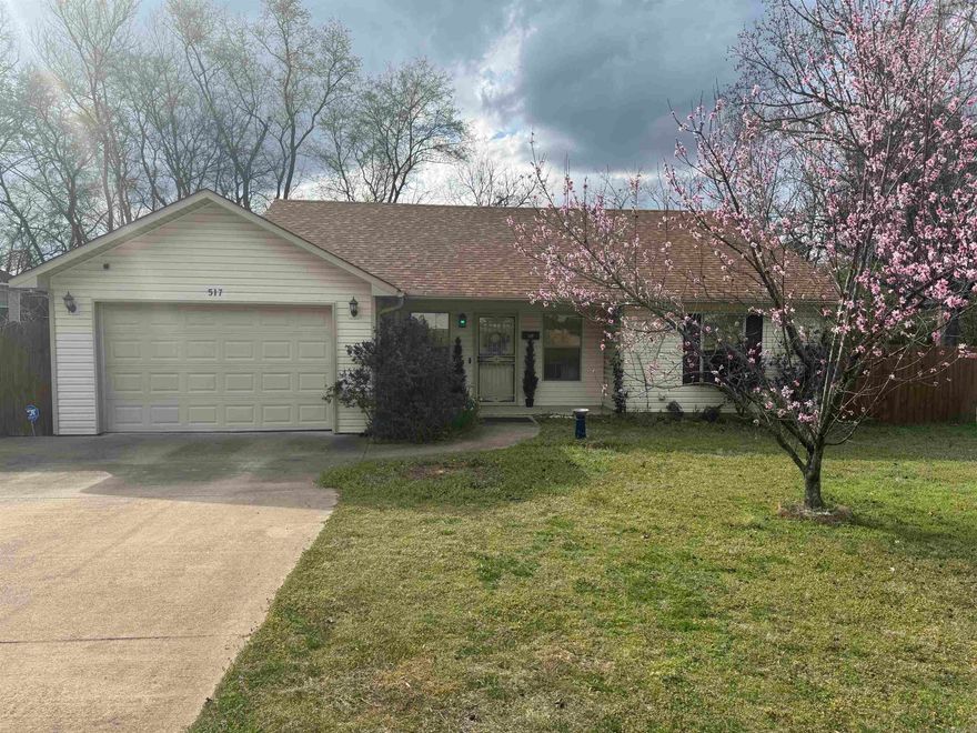 LOCATION LOCATION! Come see this very well kept absolutely adorable home in the heart of Benton. This 3 bedroom 2 bath 1292 sq ft. home is move in ready with many upgrades such as new electric fireplace wall, new roof (2024), tankless water heater, granite counter tops, HVAC (2023 est.), stainless appliances, nice privacy fence for the oversized backyard and even an electric charging station in garage. You won't find many homes this close to downtown that are this well taken care of. Schedule your private showing today. Don't snooze on this one. This one won't last long. Updated pictures coming soon.