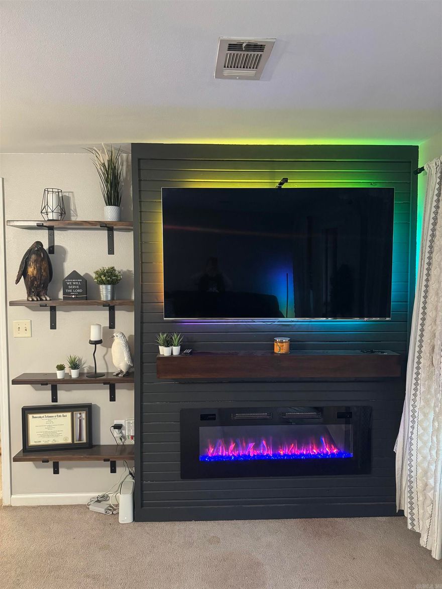 LOCATION LOCATION! Come see this very well kept absolutely adorable home in the heart of Benton. This 3 bedroom 2 bath 1292 sq ft. home is move in ready with many upgrades such as new electric fireplace wall, new roof (2024), tankless water heater, granite counter tops, HVAC (2023 est.), stainless appliances, nice privacy fence for the oversized backyard and even an electric charging station in garage. You won't find many homes this close to downtown that are this well taken care of. Schedule your private showing today. Don't snooze on this one. This one won't last long. Updated pictures coming soon.