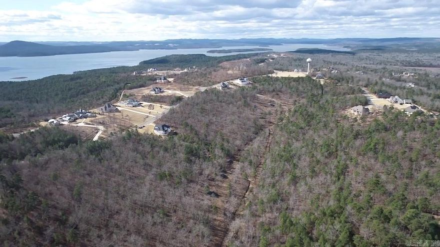 A truly rare opportunity to own 21 private acres inside the gated Waterview Estates subdivision. This exceptional property offers unmatched privacy, abundant green space, and the best of both worlds—seclusion with full access to premier neighborhood amenities.  Enjoy pickleball, tennis, basketball courts, open fields for football and soccer, and miles of scenic nature walking trails, all within the security of a gated community. Properties of this size and privacy inside a subdivision like this almost never come available.  Perfect for those seeking space, tranquility, and an active outdoor lifestyle—without sacrificing community or convenience.