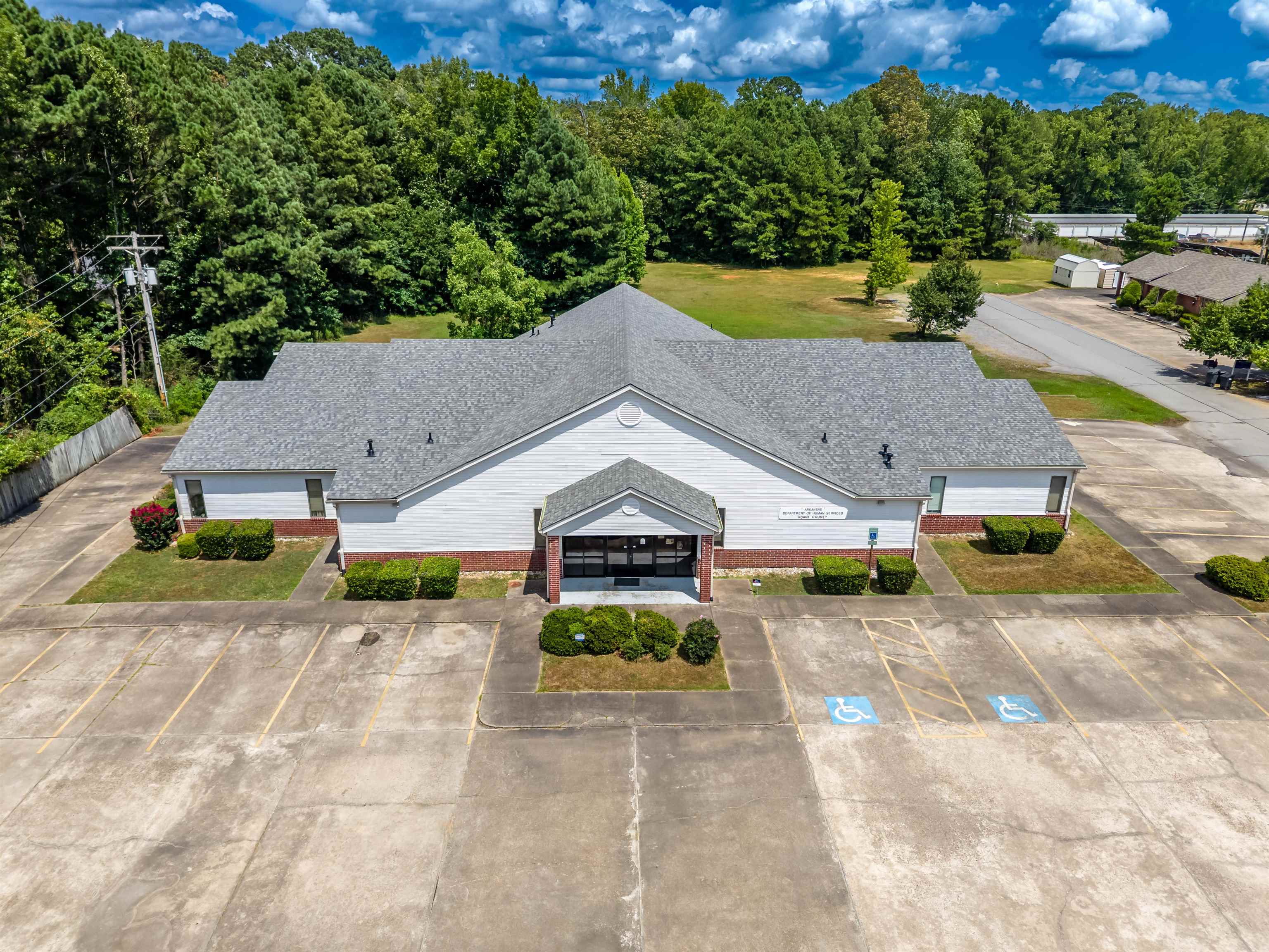 Secure. Profitable. Ready to Perform. This 7,542 sq. ft. commercial gem is more than space - it's turnkey income stream. Strategically positioned and currently secured with long-term government lease. This property delivers dependable revenue and immediate cash flow from day one. New roof in 2024. Long-Term Government Tenant. Strong Existing Income Turnkey Investment in a Thriving Location. Whether you're expanding a portfolio or seeking reliable passive income, Opportunity Drive lives up to it's name. SECOND LOCATION ALSO AVAILABLE.