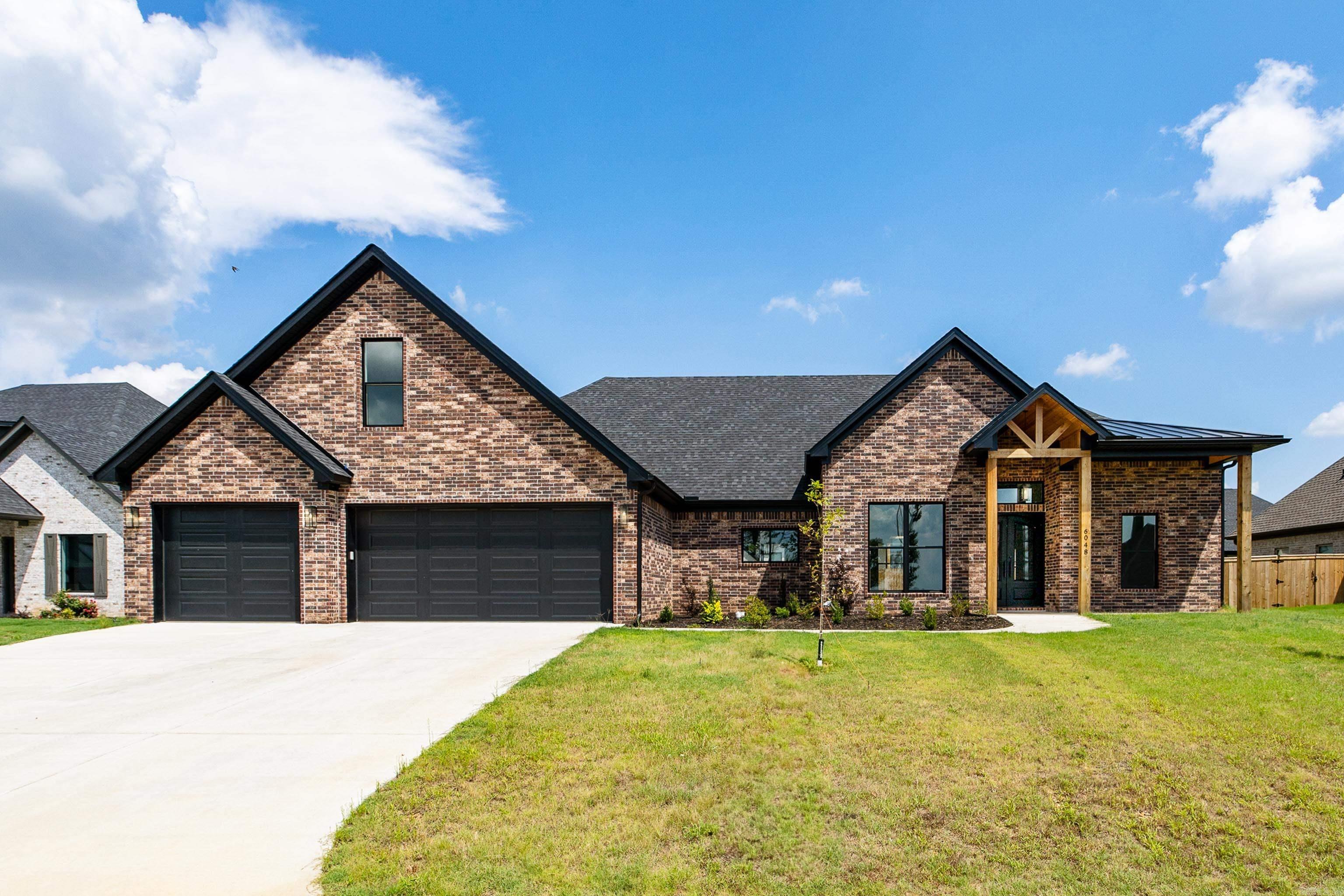 Step into this stunning new construction home with breathtaking lake views, offering 4 bedrooms and 3 bathrooms. Through the elegant double steel doors, youāre welcomed into the spacious open-concept heart of the home, where a bright living room with a gas log fireplace flows seamlessly into a chefās kitchen featuring an oversized island, breakfast area, and formal dining space. A large laundry room provides abundant storage. The luxurious primary suite offers private access to the covered patio. The spa-like primary bathroom boasts a soaking tub, walk-in shower, and generous walk-in closet. Upstairs, a bonus room with a closet and full bathroom is perfect for a game room, guest suite, or teen retreat. A three-car garage offers plenty of storage for vehicles, hobbies, or outdoor gear. This home truly has it allāschedule your private showing today!