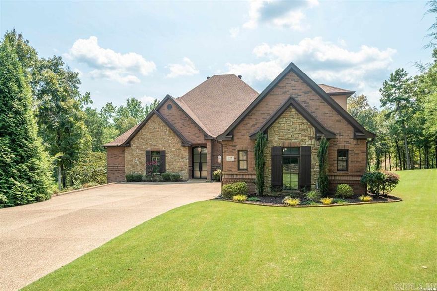 Elegant Lakeside Living in Red Oak Ridge!!!  Discover refined comfort and natural beauty in this stunning home located within a gated community—a haven of walking trails, sidewalks, two fully stocked lakes perfect for fishing, kayaking, or paddle boarding, a boat ramp, and a sparkling community pool.   This custom built 4 Bedroom, 3 Bathroom home includes a spacious bonus room above the 3-car garage. A Gourmet Kitchen outfitted with double ovens, a Jenn-Air 6 burner gas-cooktop with griddle, Miele built-in coffee station, high end appliances and natural stone countertops — we can't forget to mention the indoor grilling center complete with powerful built in ventilation hood....a chef’s dream!  The elegant interior complete with a stone fireplace, dining and breakfast areas, hardwood floors throughout, tile in kitchen and baths for durability and style along with lots of glass for natural light and open air feel.   The Primary Retreat is oversized-with enough room for a sitting area, luxurious en-suite bath, walk in shower, spa tub and an extra-large walk-in closet that is a real dream come true!