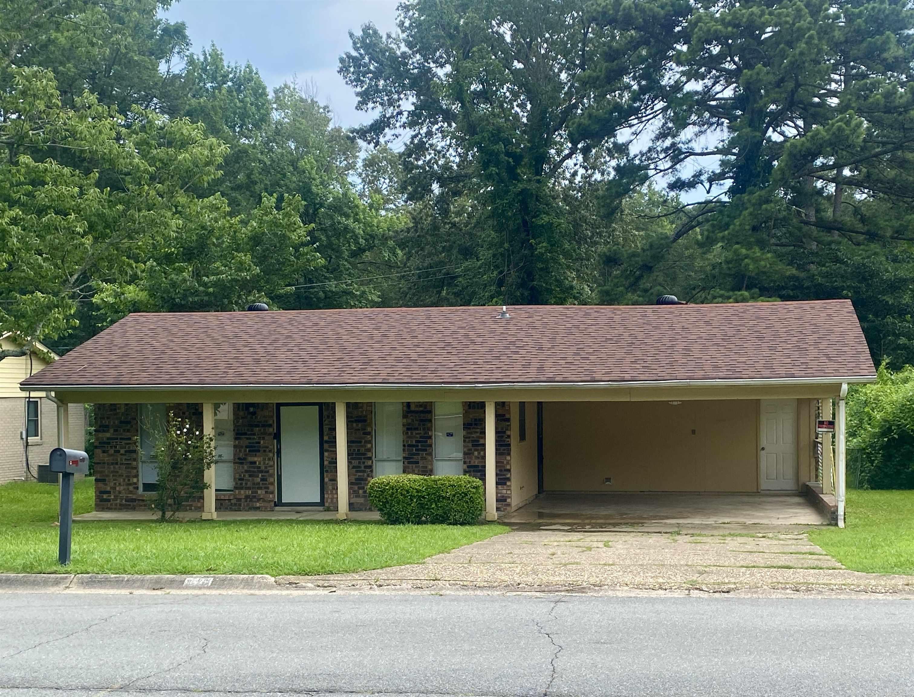 Lovely 3 bedroom and 2 bath home with 2 car carport. Home sits on a flat, fenced lot. The kitchen features granite counters with breakfast bar, large pantry, and new vent-a-hood. Updates include a new A/C last year and new roof in 2023. Master bathroom has a step down shower. Separate laundry room and additional bonus room off kitchen that would make an excellent office. This lovely home is conveniently located and ready to move in!