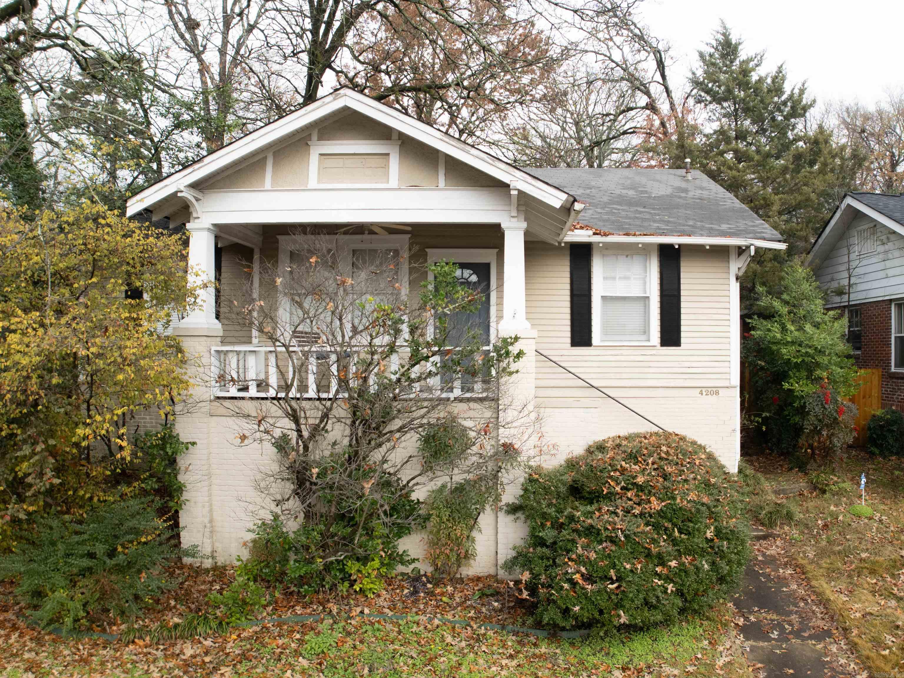 Step into this charming Hillcrest beauty that perfectly blends modern updates with classic charm! Original hardwood floors add timeless elegance, while the spacious formal dining room and kitchen offer a warm and inviting space with plenty of elbow room. Off the kitchen, you’ll find a generously sized laundry room that doubles as a pantry or storage area. Outdoor living is a dream here, with a large wood deck perfect for entertaining, a fully fenced yard, and two private parking pads in addition to ample street parking. Relax on the picturesque front porch, complete with a swing, and soak in the scenic views of this coveted Hillcrest neighborhood. Don’t miss your chance to own this blend of charm and convenience—schedule your showing today!