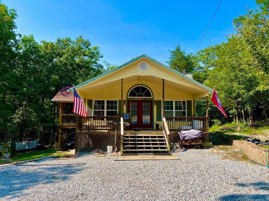 Homesteader's paradise! Experience true tranquility with this beautiful 2 BR, 2 bath, move-in ready home in a park-like setting with a seasonal creek, screened-in porch, detached garage/shop with an upstairs apartment with separate bathroom & washer/dryer for overnight guests! The main house has central heat and A/C, with an additional outdoor Hardy wood-burning furnace/boiler setup that can heat both structures. Cool off from the summer heat in the above-ground swimming pool, situated on a beautiful patio area with a gazebo for taking a break or entertaining guests. Teaming with wildlife, the 20 acres m/l also sports a fenced-in area for animals/garden and a small orchard containing peach, plum, apple, pear & cherry trees. Conveniently located in the Arkansas Ozarks and to Bull Shoals Lake and the Buffalo National & Whit Rivers. Enjoy seclusion & privacy with the convenience to work from home with high-speed fiber internet. Call for showing today! 4-wheel drive recommended.