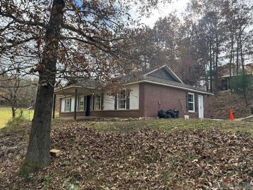 3BR, 2BA HOME ON 1.5 ACRES!  This 1500 square foot home has 3 bedrooms and 2 bathrooms including a master suite with private bathroom and walk in closet. Eat in kitchen with brand new appliances. Stove, refrigerator, microwave and dishwasher. Large living room! Laundry area in bathroom. Laminate flooring. Brick and siding. Shingled roof. Sitting on 1.5 acres on a dead-end paved road. Just 5 miles from city limits!