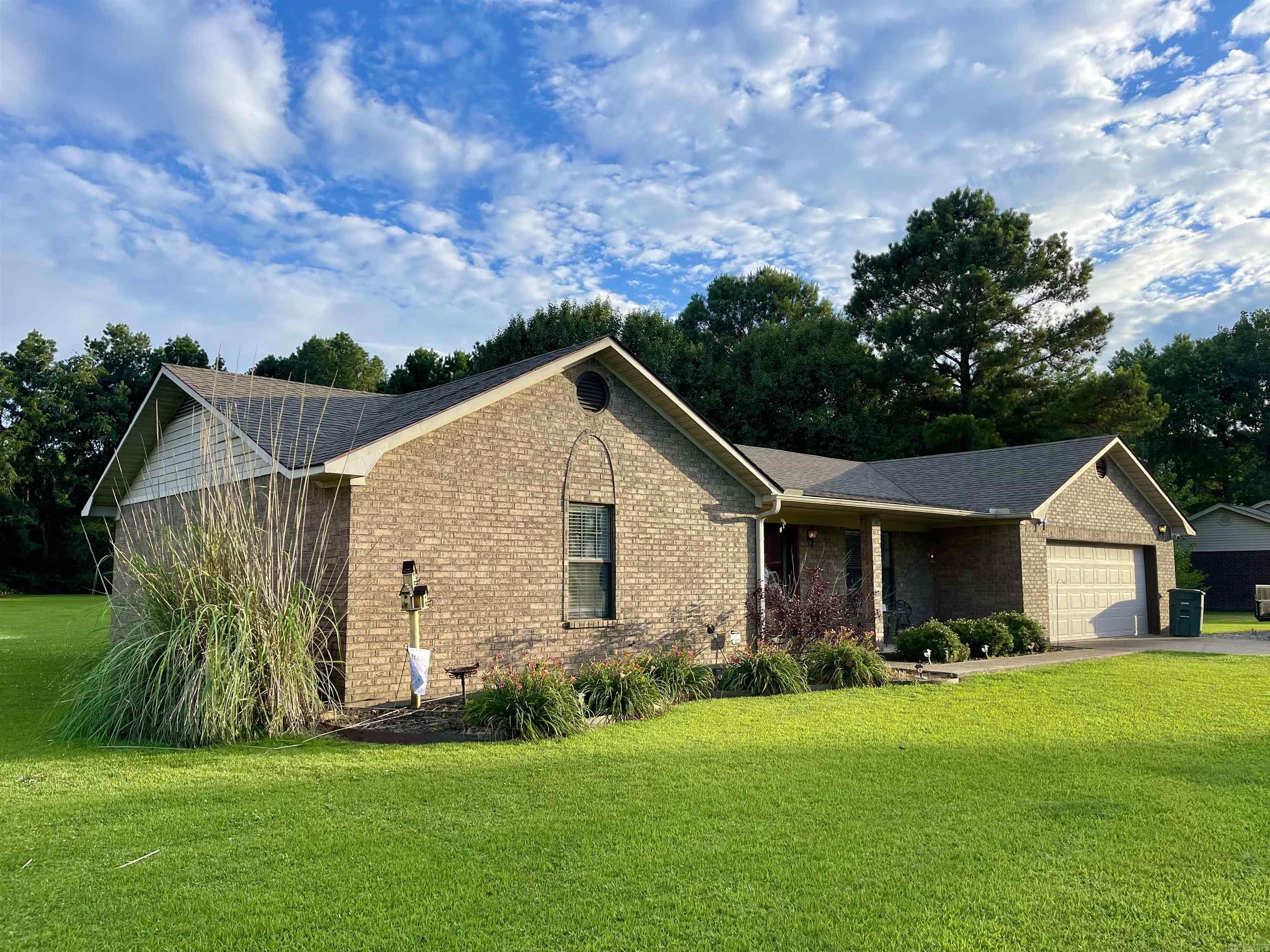 Welcome to your dream home at 75 County Road 426 in Jonesboro. This stunning single-family property is now for sale, offering the perfect combination of style, comfort and convenience. With 4 bedrooms, 3 bathrooms, and a spacious floor plan, this home offers ample space for you and your family to enjoy. As you step inside, you will be greeted by an inviting atmosphere and tasteful updates throughout. The kitchen is a true highlight with granite countertops and an abundance of cabinets. A wonderful place to entertain guests. The bedrooms are spacious and filled with natural light. There are 2 primary bedrooms with their own bathroom and located on opposite sides of home. Perfect setup for a teenager or mother's quarters. Take notice of the new LVP flooring in living room and hallway. The home also offers neutral paint colors throughout. The backyard is amazing and such a wonderful place for the kids to play and the dogs to run around in. The lot size is approx 1 acre and plenty of space for outdoor activities and gardening. There is a large deck off the back that is perfect for gathering of friends/family for summer barbeques.