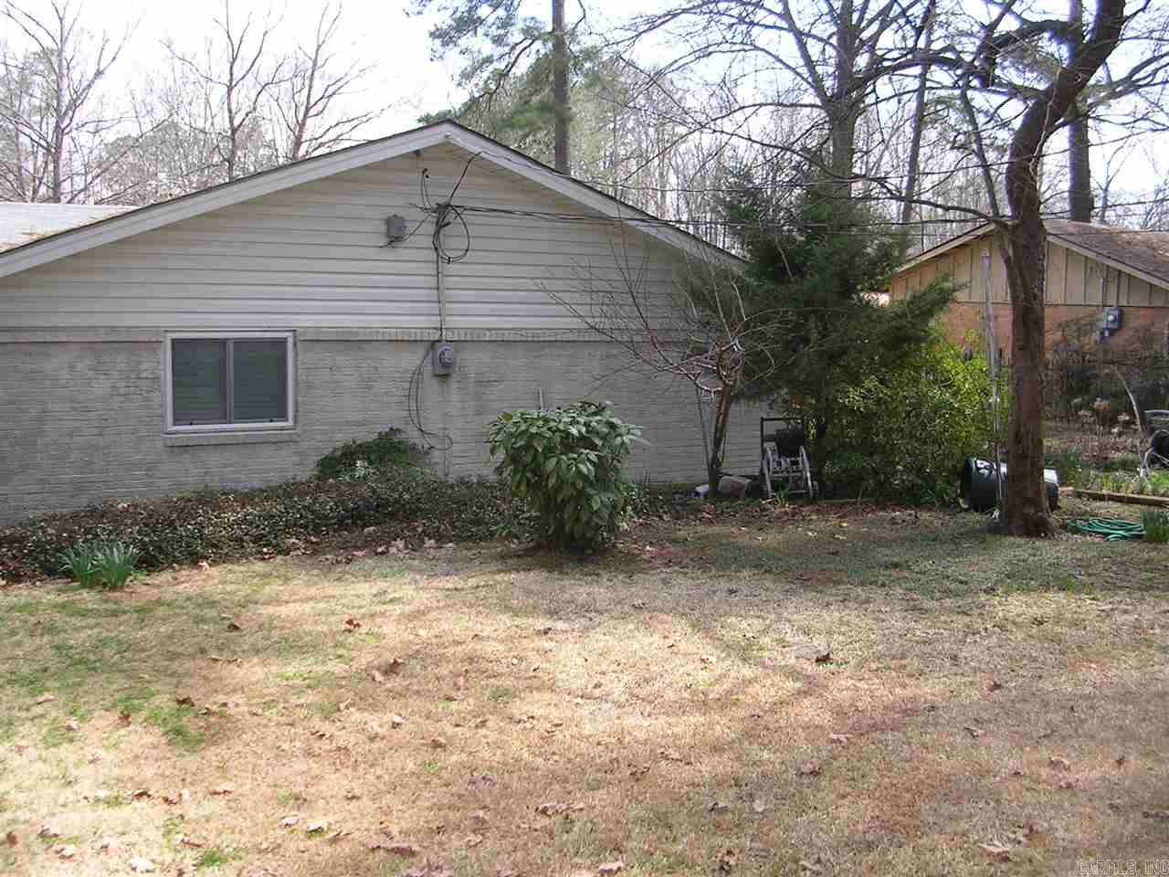 Little Rock Bargain! Convenient to Schools, Shopping, Little Rock Offerings! Living room, den, cozy kitchen breakfast, four bedrooms, 2 full baths, large patio for entertaining, fenced yard with storage building.