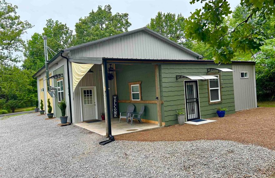 Say hello to your newly finished Barndominium. Seller has transformed a three-bay shop, into a wonderful living space. Now featuring a 2 bedroom, 1 bath home with 2300 sq ft. Home has a beautiful master bedroom with a custom woodwork , 'LifeProof' vinyl flooring and innovative lighting. Main living area contains a custom designed kitchen with all new. and matching appliances. Main features includes  the addition of 2 mini  splits, a propane wall heater, and a 'Vermont Castings' wood stove. The middle has been converted into a large recreation room/bedroom This is a large enough area comfortable enough for daily life. Bedrooms could be added or the creation of a rentable efficiency apartment. Large garage spaces are open for your vision. Several pieces of furniture convey, full list upon request. Located within walking distance to the Court Square, and City Park. Short drive to the Ozark Folk Center , The White River. and Blanchard Springs recreation area. This innovative Barndominium blends rustic charm with modern comfort. Call today to see this truly unique and wonderful property.