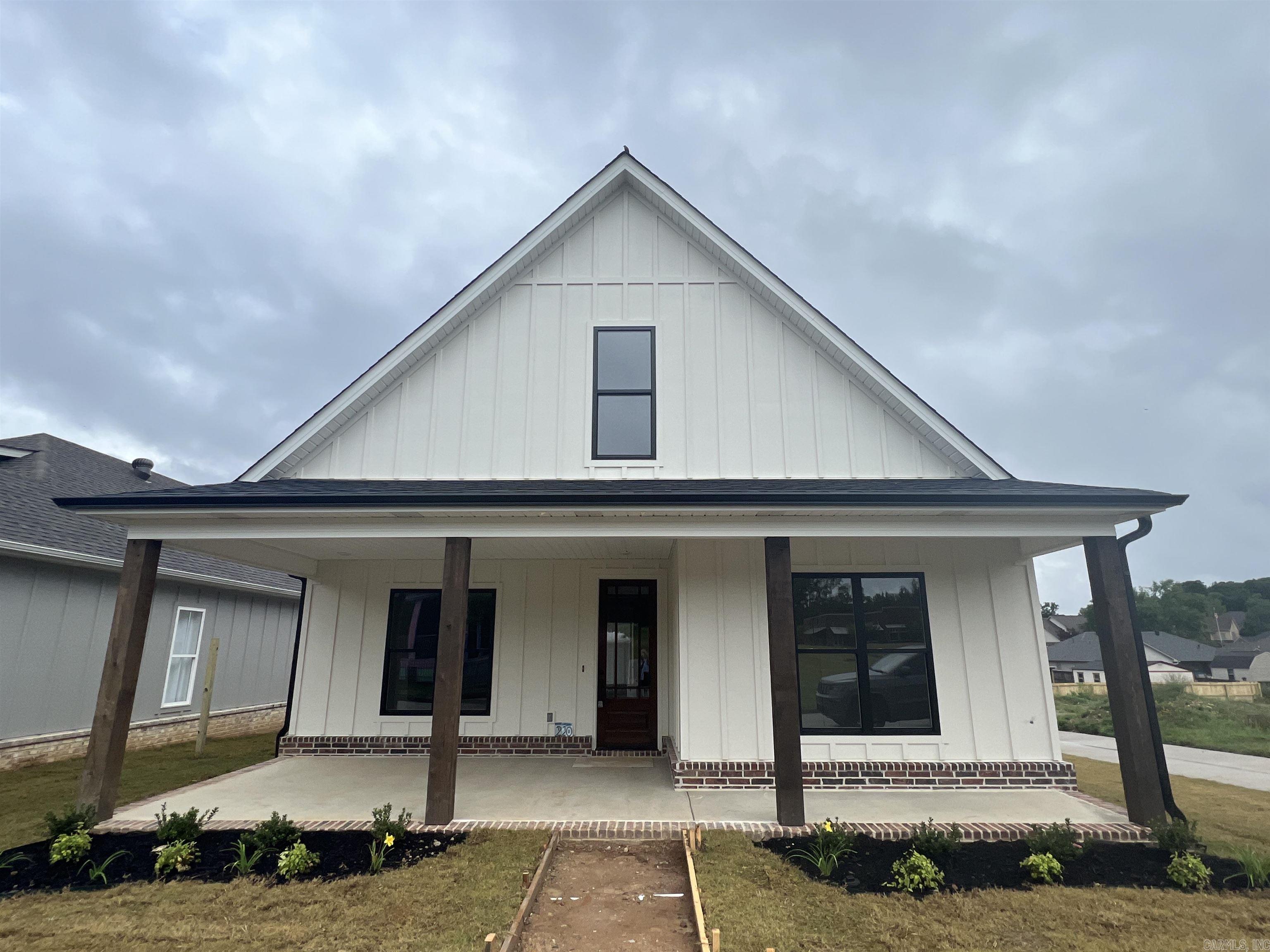 $10K IN BUILDER CREDITS WITH APPROVED OFFER! Adorable Craftsman style home in Bryant's most unique community! Enjoy designer curated finishes, front porch living, and amazing amenities such as a community pool, park, and seasonal Farmers Market. This home features an open concept floor plan perfect for everyday life or entertaining family and friends plus a completely separate upstairs en suite! Quality and craftsmanship from AR Times' Best Home Builder of 2022 are just added perks of this adorable home. This beauty is nearing completion and is ready for YOU! Claim it today!