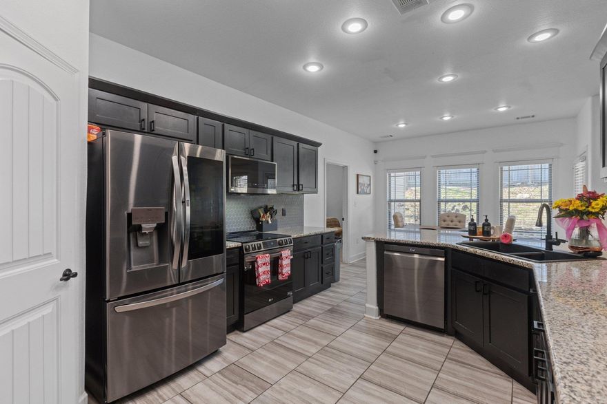 Charming Move-In Ready Home Just Minutes from Little Rock! This beautiful home offers the perfect blend of convenience and comfort, located close to all that Benton and Bryant have to offer. Step inside to find a freshly updated kitchen featuring energy-efficient stainless-steel appliances, a stylish backsplash, and freshly painted cabinets. The entire home has been refreshed with new paint, new carpet, and a brand-new roof, making it truly move-in ready. The layout is both functional and inviting, with four spacious bedrooms on the main level and a large bonus room upstairs. The bonus room offers endless possibilities, it’s ideal for a media room, playroom, home office, or workout space. The private owner’s suite is a retreat of its own, boasting a spa-like bathroom with a large walk-in shower, a relaxing soaking tub, and plenty of storage. Enjoy the cozy fireplace in the living room, abundant natural light, and a backyard ready for your personal touch. This home combines modern updates with a thoughtful layout, offering everything you need and more. Don’t miss your chance to see it, schedule your showing today!