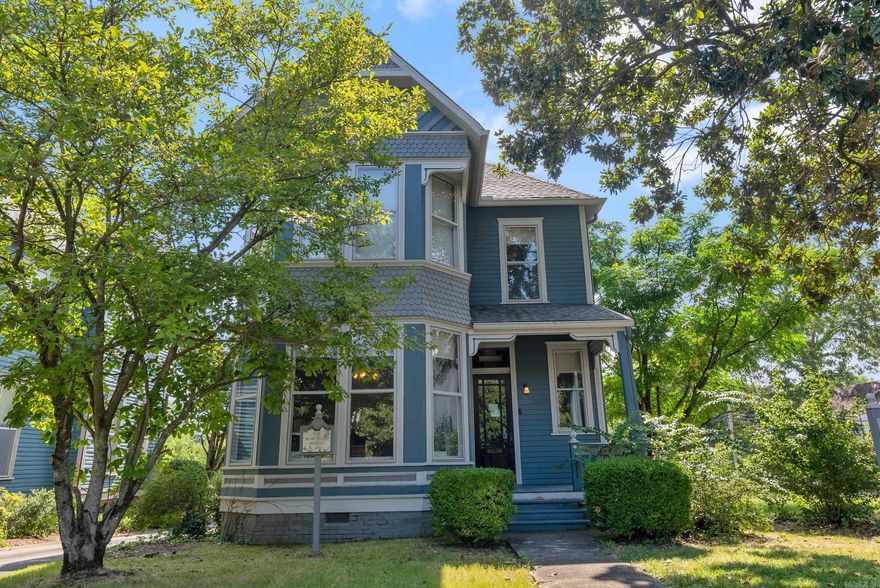 The Buchard House. One of Little Rock's boasted Governor's Mansion District homes, this 1890 Queen Anne Victorian has been a law office but would easily return to being a great home. Or both! While some repairs are needed, the fireplace tile, the floor to ceiling bookcases with rolling ladders, the staircase, the trimwork throughout, and other period amenities cannot be replicated with the historic charm this house offers. Vintage Quapaw Quarter! Buyer's agents, see remarks