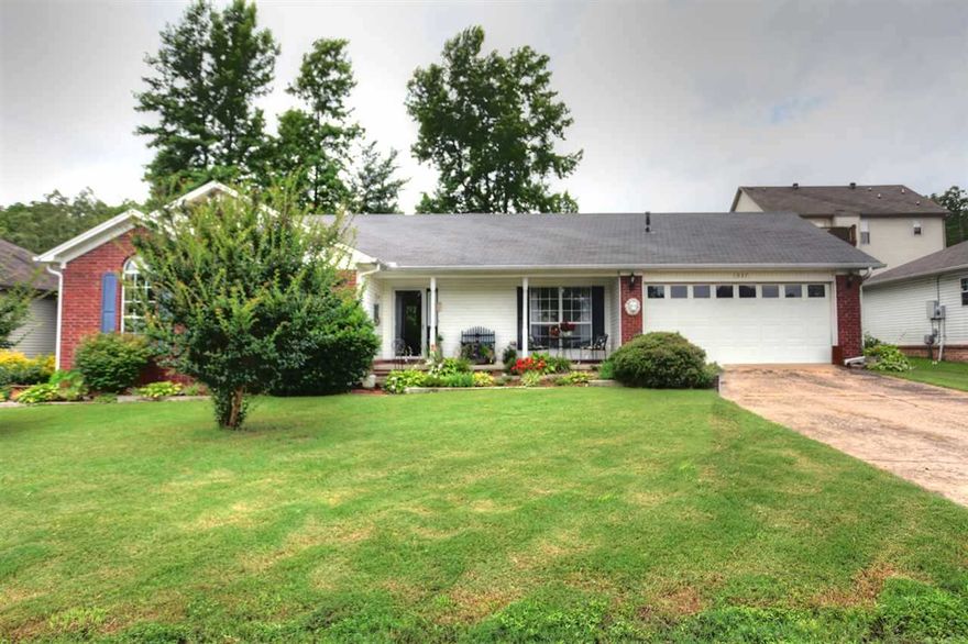 Recently painted on interior! This darling home has 3 large bedrooms, 2 full baths. Off the kitchen is a room currently being used for an art studio.  Well maintained.   Bedrooms are all good size. Features covered front porch, refrigerator conveying with property.  Great covered back patio, fireplace, vaulted ceiling, wood in dining room.  Within minutes to the air base.  Easy on, Easy off to interstate for easy commute.