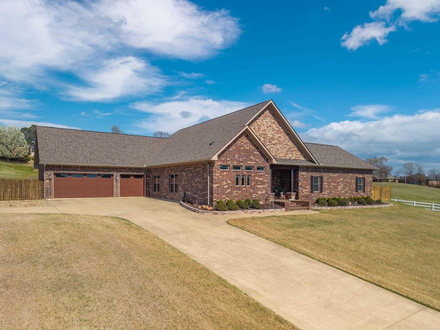 An Exceptional West Winds Estate with Private Poolside Retreat & Lake Access! Experience elevated living in this thoughtfully designed home set on a half-acre in the prestigious West Winds Community.  Refined interiors feature engineered hardwood floors, vaulted wood ceilings, and a statement double-sided gas fireplace. The chef’s kitchen offers granite surfaces, custom cabinetry, an expansive island, and a butler’s pantry designed for effortless entertaining.  complementing the home’s elegant design, an spacious bonus room provides the ultimate in flexible living—ideal for a private home theater, executive office, guest bedroom, or stylish game room. This inviting space offers endless possibilities for work, relaxation, and entertainment.  Outdoors, a covered wood-ceiling patio, an immaculate outdoor kitchen, and stunning inground pool with access to an exterior half bath create a private resort-style setting.