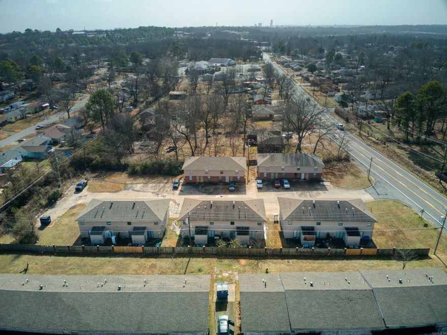 Strong addition to any portfolio—this 20-unit income-producing property in North Little Rock features 5 buildings on nearly 1.5 acres. All units are 2 bed, 1.5 bath with in-unit laundry. Tenants pay all utilities except water. Roofs are less than 5 years old; low-maintenance exteriors. Several units have been updated with new flooring, fixtures, cabinets, appliances, and granite countertops. Plenty of parking. Consistent cash flow with value-add potential—don’t miss this opportunity!  See agent remarks.