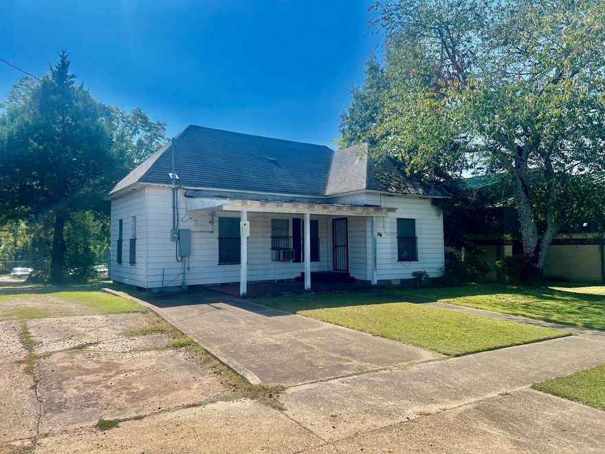 If you are looking for your next remodel project in a nice quiete neighborhood this could be a perfect fit.  Setting right next door to Oaklawn Elementary is your chance at a great rental or flip.  The home has great bones but has had a small fire in the kitchen and sustained damage.  So there will be extensive work thoroughout the home.  The property also has a garage/shop building in the back. This can be accessed from the pavedalley way.  Only a couple of blocks from Oaklawn Racing and Casino!  Make this your next investment property.  Sold "As-Is"