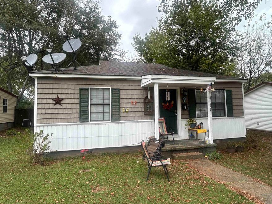 Great little two bedroom, 1 bath, home with central heat and air, large kitchen with washer and dryer, pretty nice backyard with storage building.  Currently being uses as a rental.  Makes a great starter home or rental.  See agent remarks.