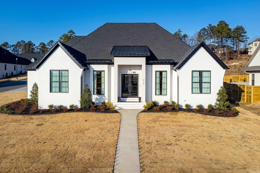 Stunning home located on flat corner lot with side loading three car garage.  Soaring ceilings with open dining room, living room and kitchen.  Gourmet kitchen with every attention to detail with chefs range and two ovens.  Three bedroom suites on main level plus office.  Separate guest half bath.  Upstairs is set up as a media room with wet bar and full bath and could be bedroom.  Walk out backyard with covered patio and fireplace.  Extra landscaping added for privacy.  Pool plans can convey if interested.  Come see!