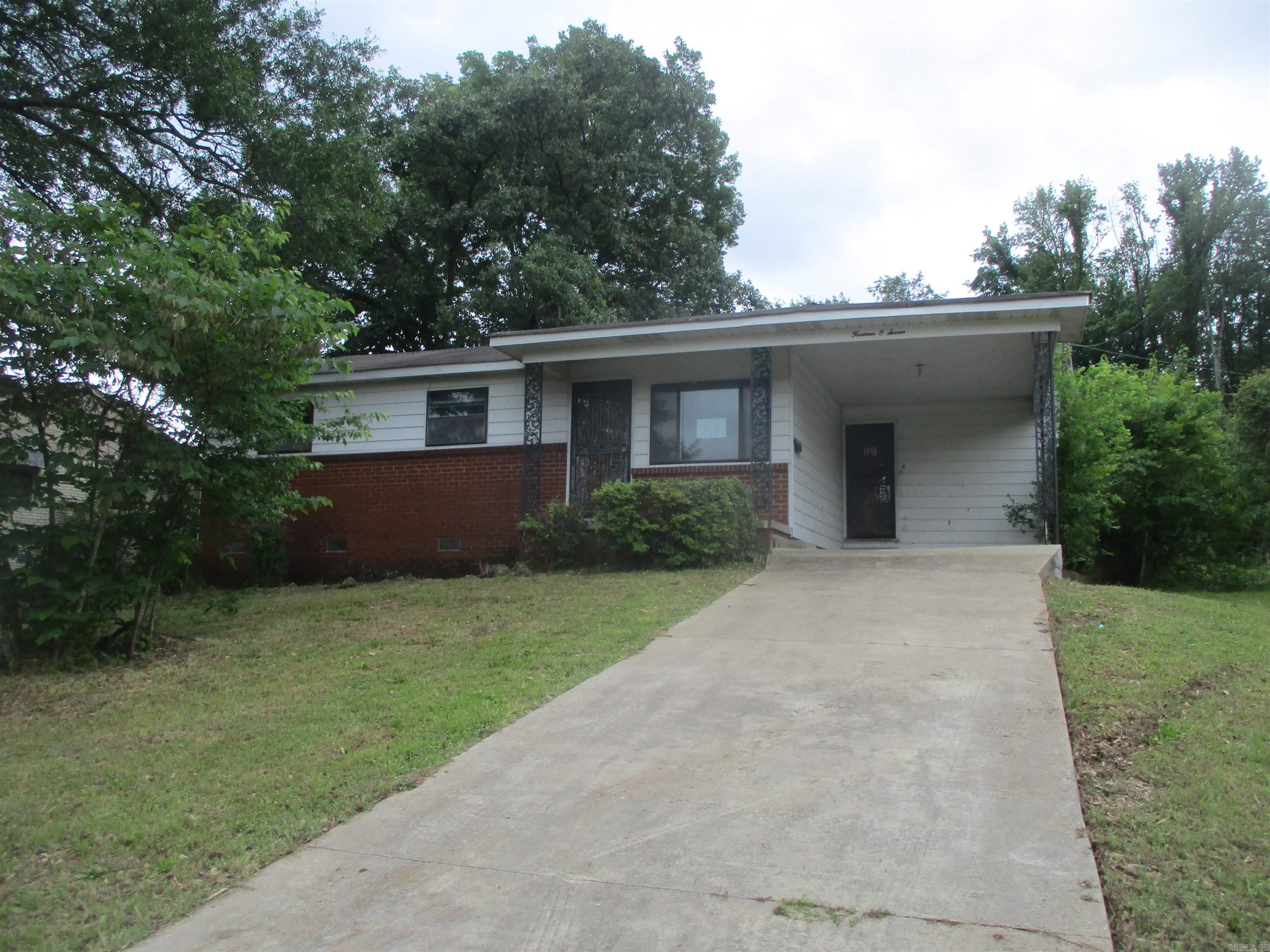 Investors don't miss out on this great opportunity close to downtown Little Rock. This cute 3 bed 2 bath home features covered parking and a fenced in backyard. With a little TLC and some elbow grease this property could really be something special. Don't miss out on this great space buy!! **Agents please READ agent/confidential remarks section for additional information, showing and offer instructions**