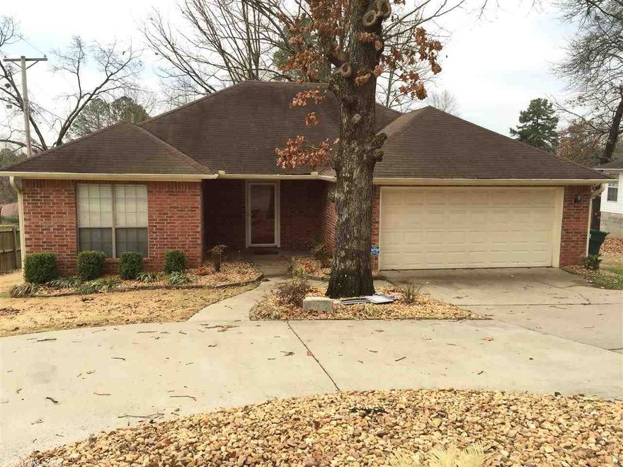 Come see this gorgeous home nestled away in a quiet West Little Rock community. Convenient to downtown and West Little Rock shopping, this home has a lot to be impressed with; like gleaming hardwood floors, crown molding, split floor-plan, and great master suite equipped with his/her sinks and a separate walk-in shower. The yard has a automatic sprinkler system with a circular driveway and is within walking distance to Parkview High School. Come see this great house and make it a home.