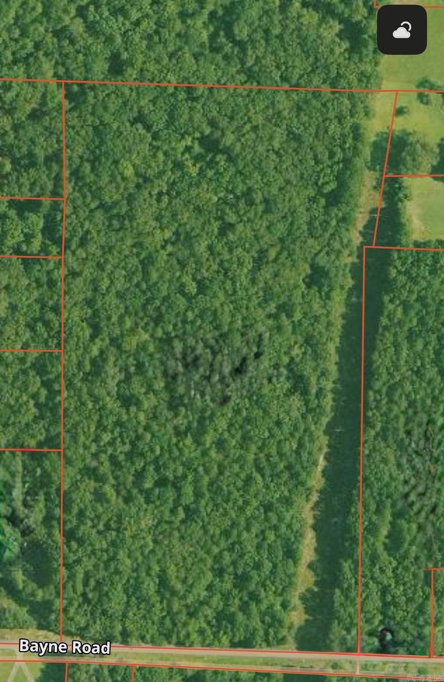 21.3 Acres – Mixed Timber Tract in Rural Hot Spring County  Discover 21.3 beautiful acres of mixed mature hardwood and pine located in the quiet Harp area just south of Malvern. This scenic property offers a peaceful rural setting with convenient access from a paved county road and available utilities at the road frontage—ready for your dream home, weekend getaway, or recreational retreat.  The land features gently rolling terrain, a nice blend of shaded hardwoods and merchantable pine, and plenty of room to explore or develop. Whether you’re looking to build, hunt, or invest in timberland, this tract provides the ideal balance of privacy and accessibility.  Key Features:  21.3 wooded acres with mature hardwood and pine Paved county road access Utilities available at the road Rural, peaceful setting south of Malvern in the Harp community Excellent potential for homesite, recreation, or timber investment A rare opportunity to own a versatile piece of Arkansas countryside with easy access to town yet all the tranquility of rural living.