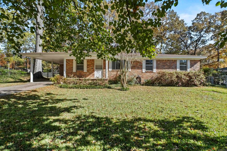 All brick 3 bedroom/1.5 home sitting on half acre lot.  Home features gas cooktop, dishwasher and extra room that could be a bedroom or office.  Laundry room is in the carport but is a spacious size.  Hardwood floors under the carpet.  Small shop in the backyard.  Extra half acre lot will be included with this home and sits directly behind this lot.  Home is eligible for Rural Development Loan.